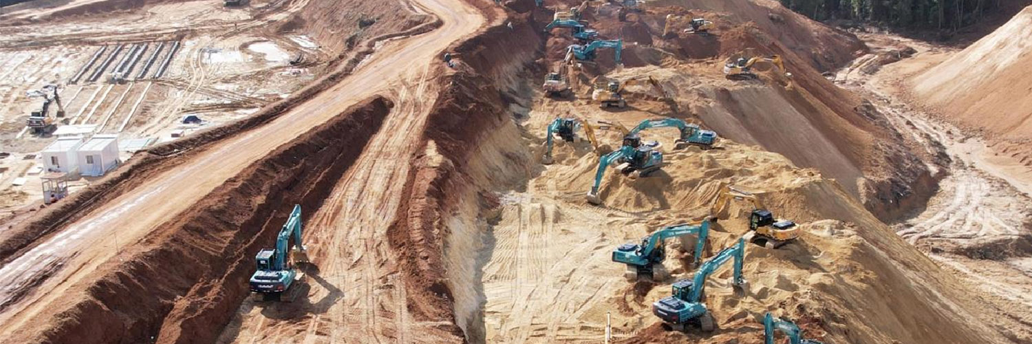 Indonesia-Excavators at Mining Trucks